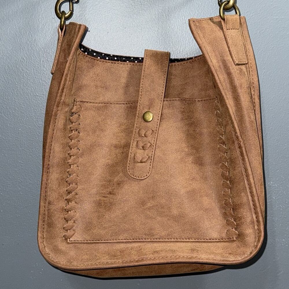 Crossbody purse with removable strap snap closure pocket brown black interior